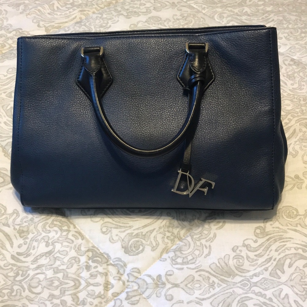 Used DVF purse in good condition blue and black